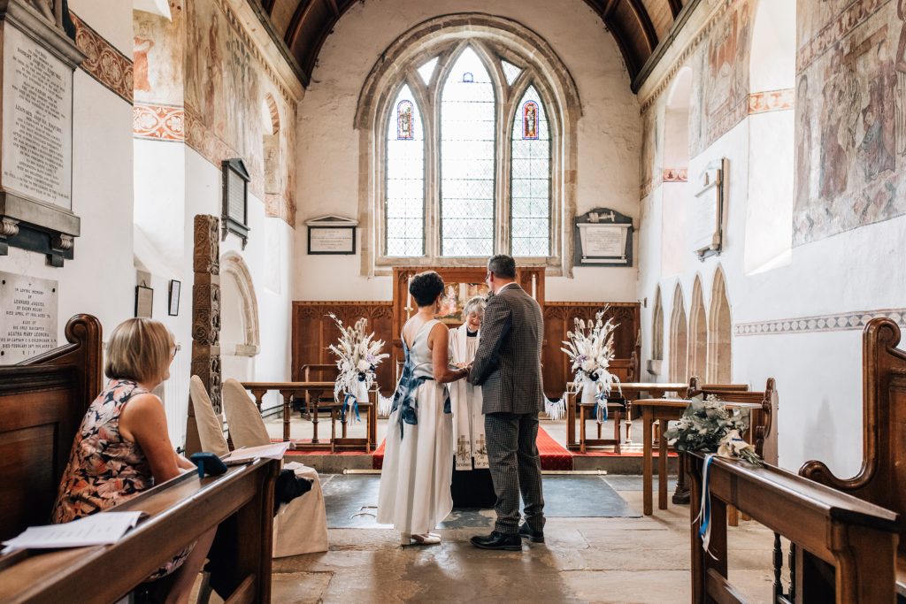 Summer marriage ceremony at St Agatha's church at Easby Abbey, Richmond.