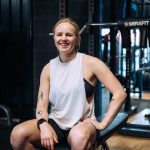 Portrait of a female personal trainer in a gym.