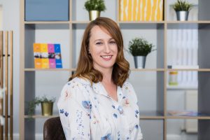 Headshot of a business women in an office environment